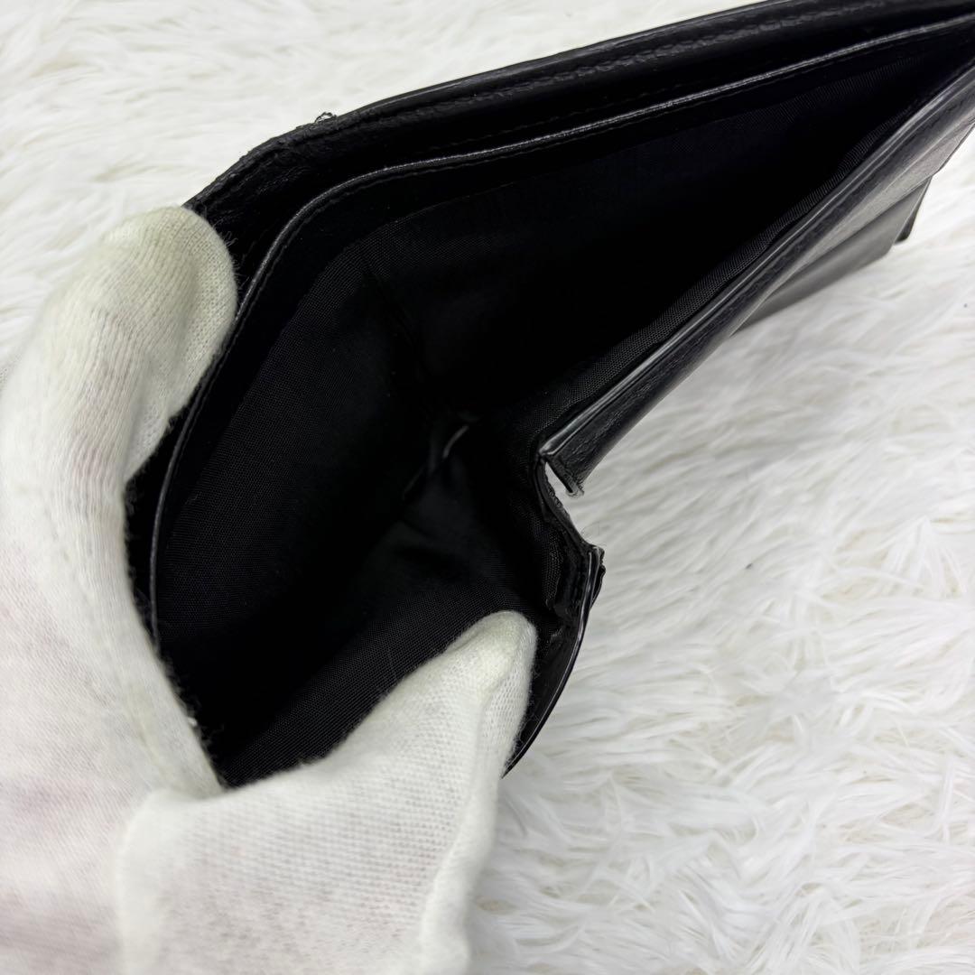 美品✨サンローラン　二つ折り　折り財布　カサンドラ　金ロゴ　レザー　ブラック