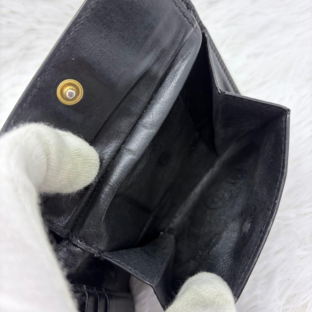 美品✨サンローラン　二つ折り　折り財布　カサンドラ　金ロゴ　レザー　ブラック