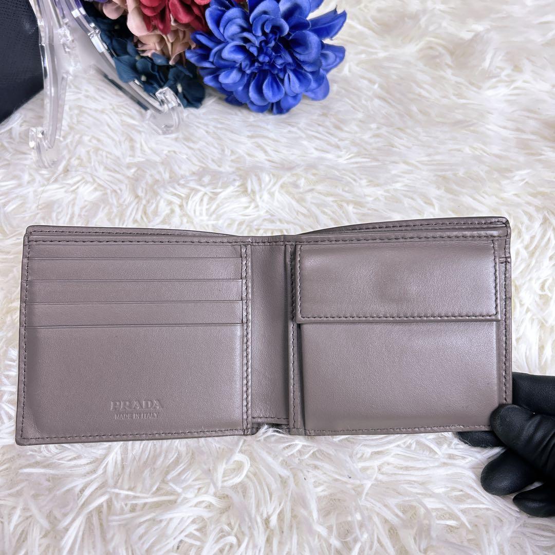 現行モデル PRADA パース付きレザーウォレット 三角プレート RFID