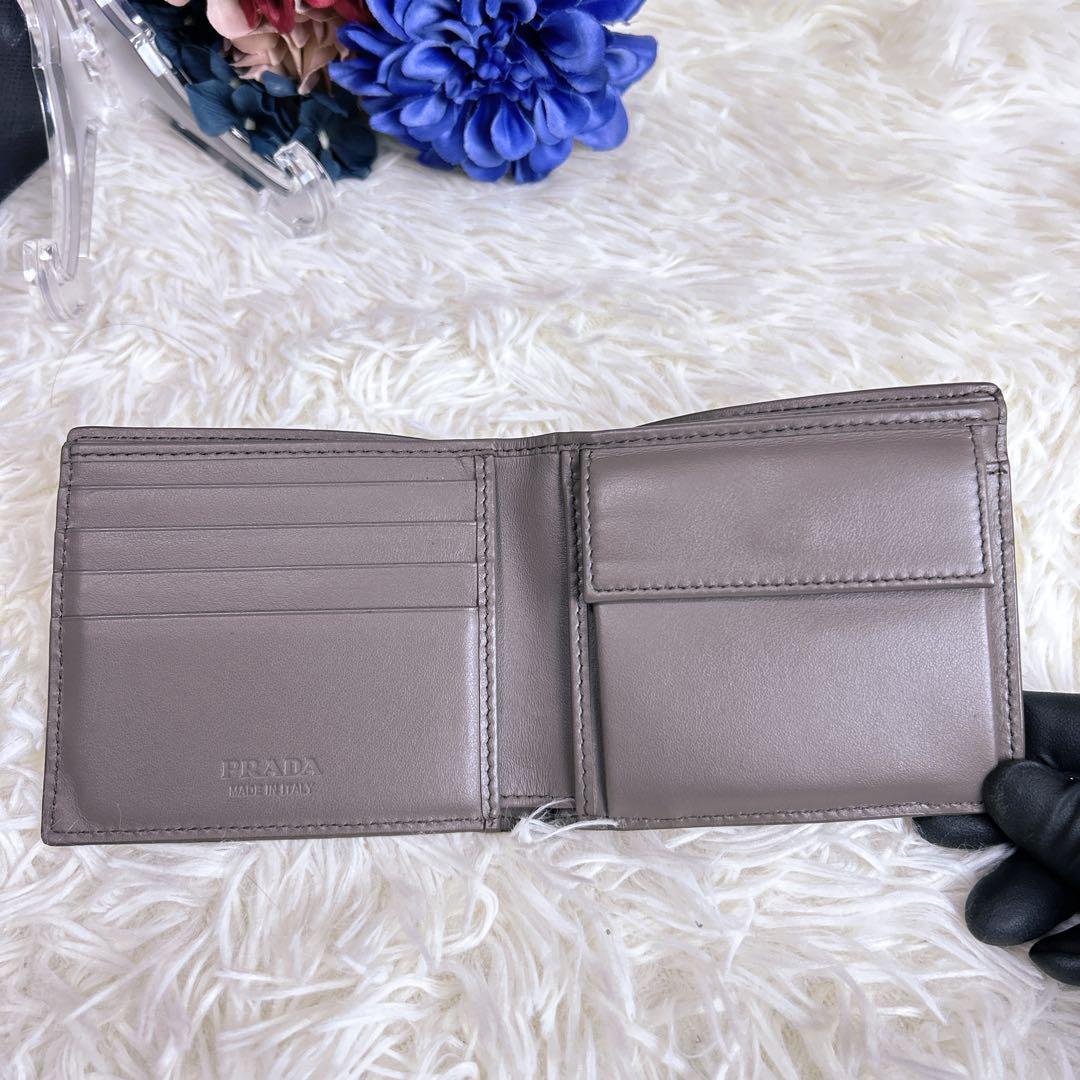 現行モデル PRADA パース付きレザーウォレット 三角プレート RFID