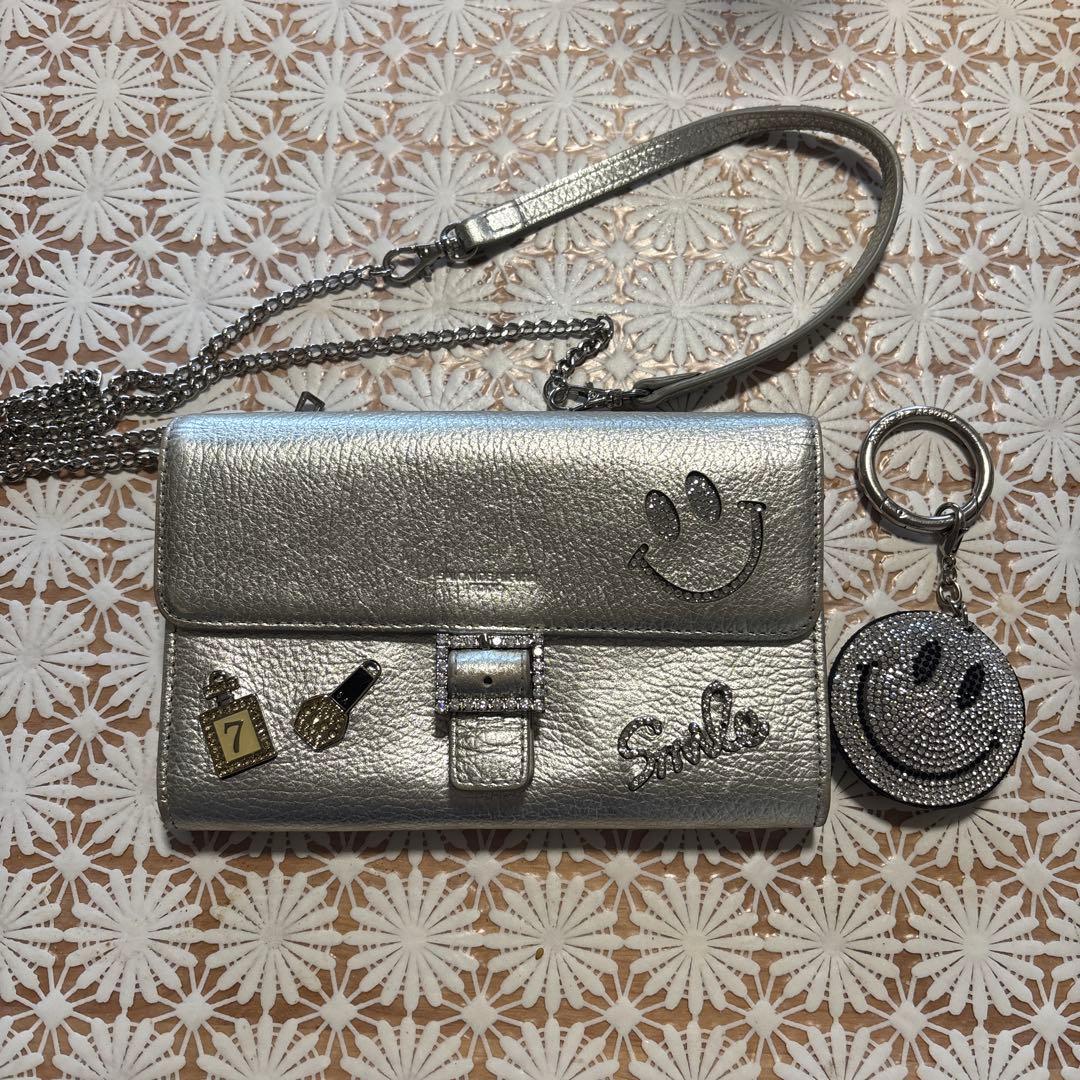 シルバー スマイルマーク クラッチバッグ