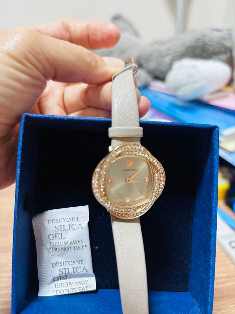 Swarovski クォーツ腕時計 ゴールド/ベージュ