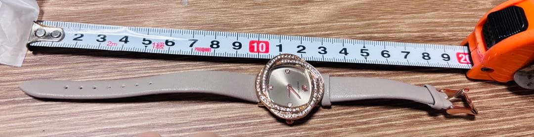 Swarovski クォーツ腕時計 ゴールド/ベージュ