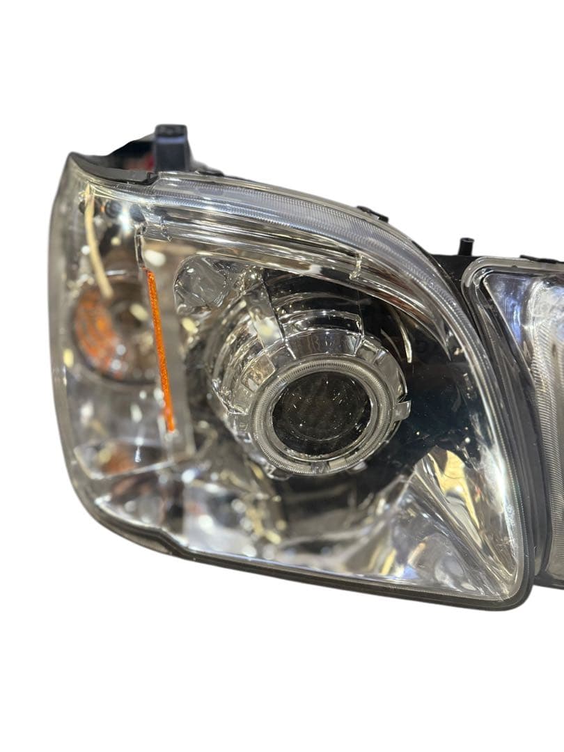 EAGLE EYES ランクル100 LX470 イカリング ヘッドライト