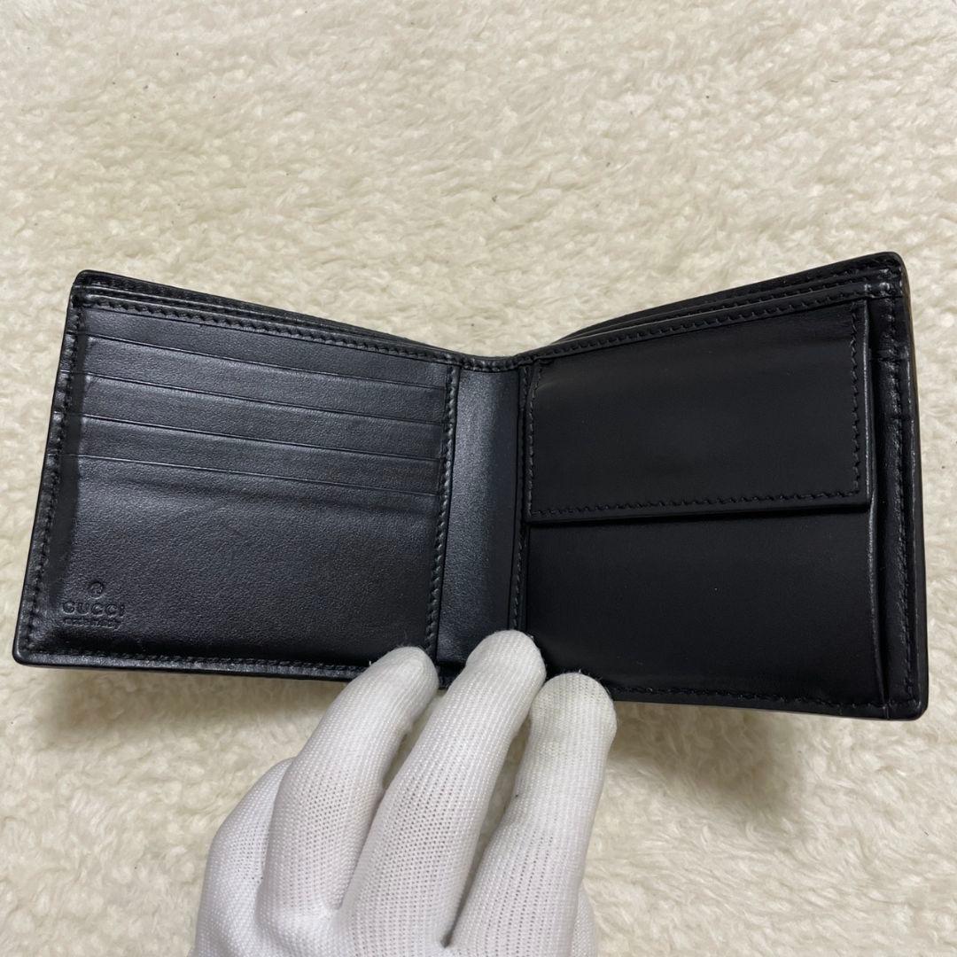 GUCCI　グッチ　折り財布　エンボス　ブラック　美品‼️