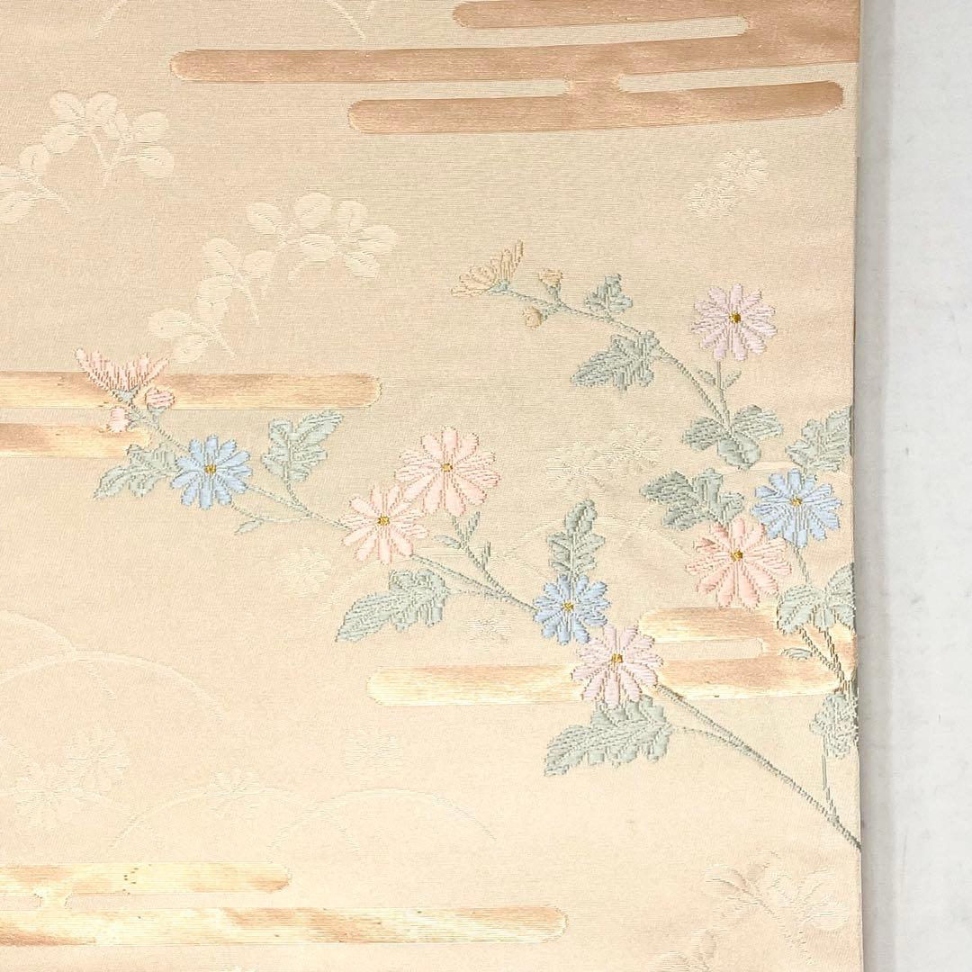 未使用［ 名古屋帯/ポリエステル ］東レシルック　生成り　菊　霞　芝草　洗える