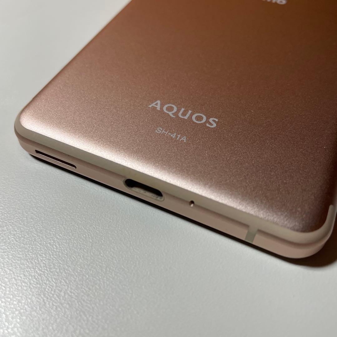 中古美品AQUOS sense4 SH-41Aスマートフォン本体ライトカッパー