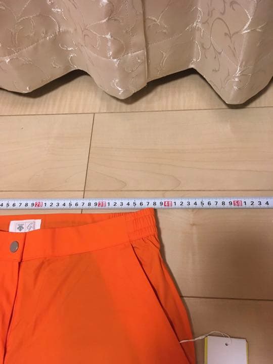 新品未使用　デサントのレインウェアセットアップ　オレンジ／黒　サイズO(TL)