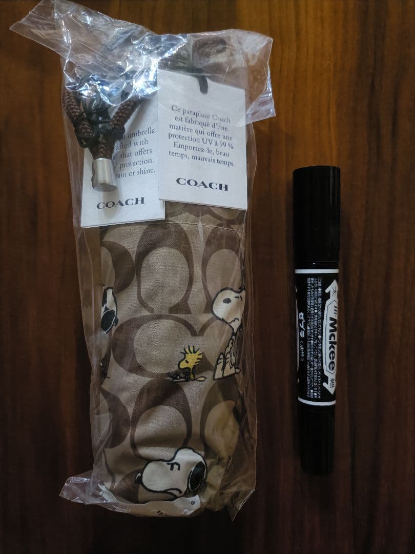 【本日のみ値引き】コーチ　スヌーピーコラボ　折りたたみ傘 晴雨兼用