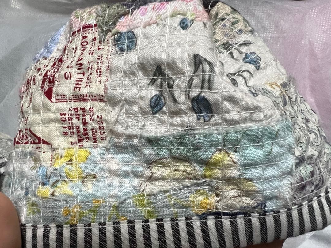 毛塚千代さんの糸食い袖カバー