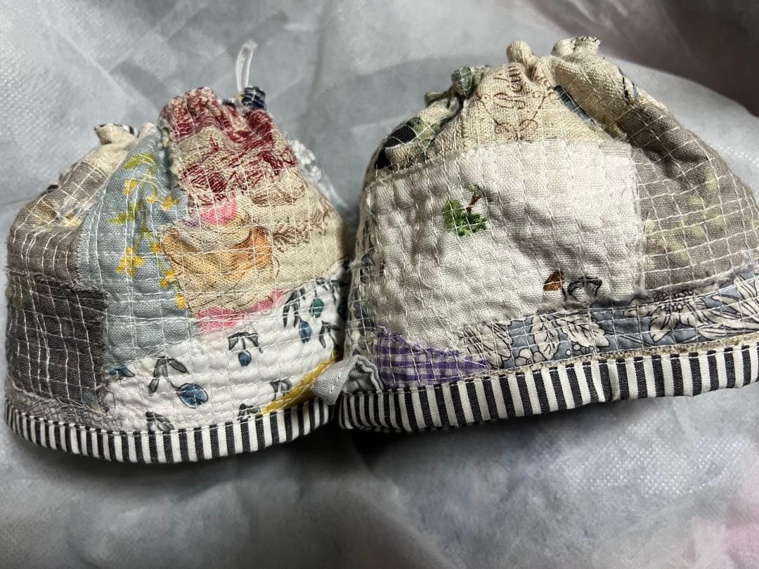 毛塚千代さんの糸食い袖カバー