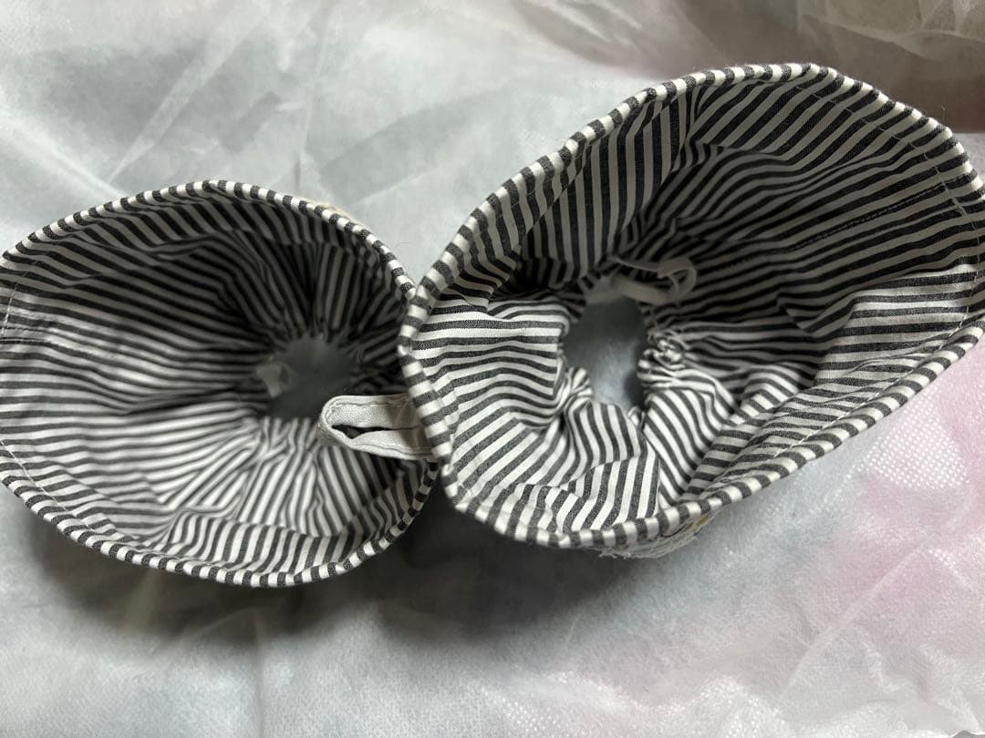 毛塚千代さんの糸食い袖カバー