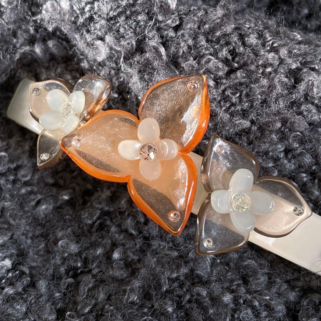 アレクサンドルドゥパリ フラワー バレッタオレンジ クリア 透明 夏ヘアアクセ