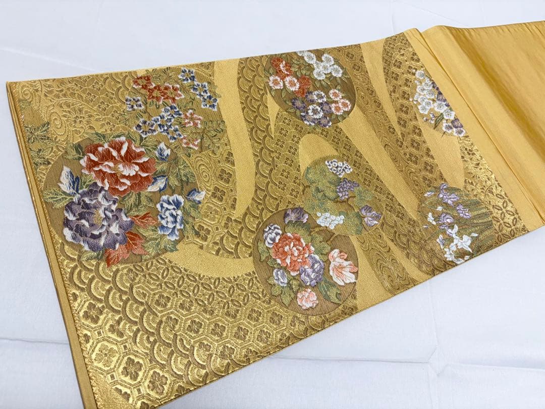 A5美品 花々 流水 葡萄 唐草唐花 華文 七宝 青海波 金糸 正絹 六通 袋帯