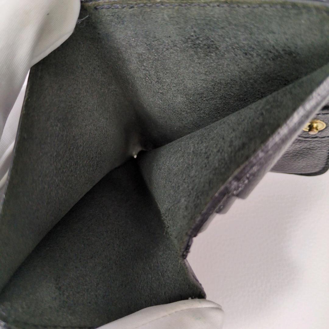 おっぽーイルビゾンテ ラウンドジップ ファスナー 二つ折り財布 ブラック