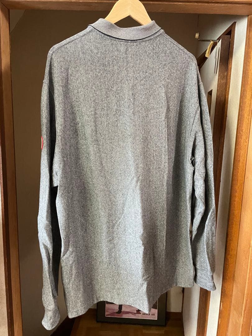 トップス C.E(CAV EMPT)STRIPE RIB LONG SLEEVE POLO