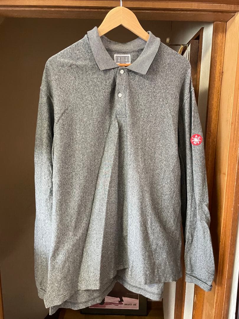 トップス C.E(CAV EMPT)STRIPE RIB LONG SLEEVE POLO