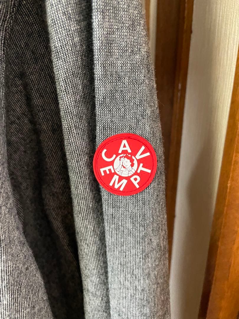 トップス C.E(CAV EMPT)STRIPE RIB LONG SLEEVE POLO