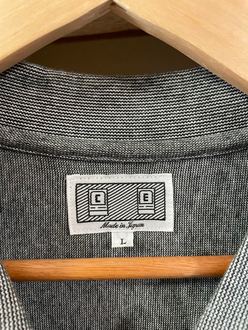 トップス C.E(CAV EMPT)STRIPE RIB LONG SLEEVE POLO