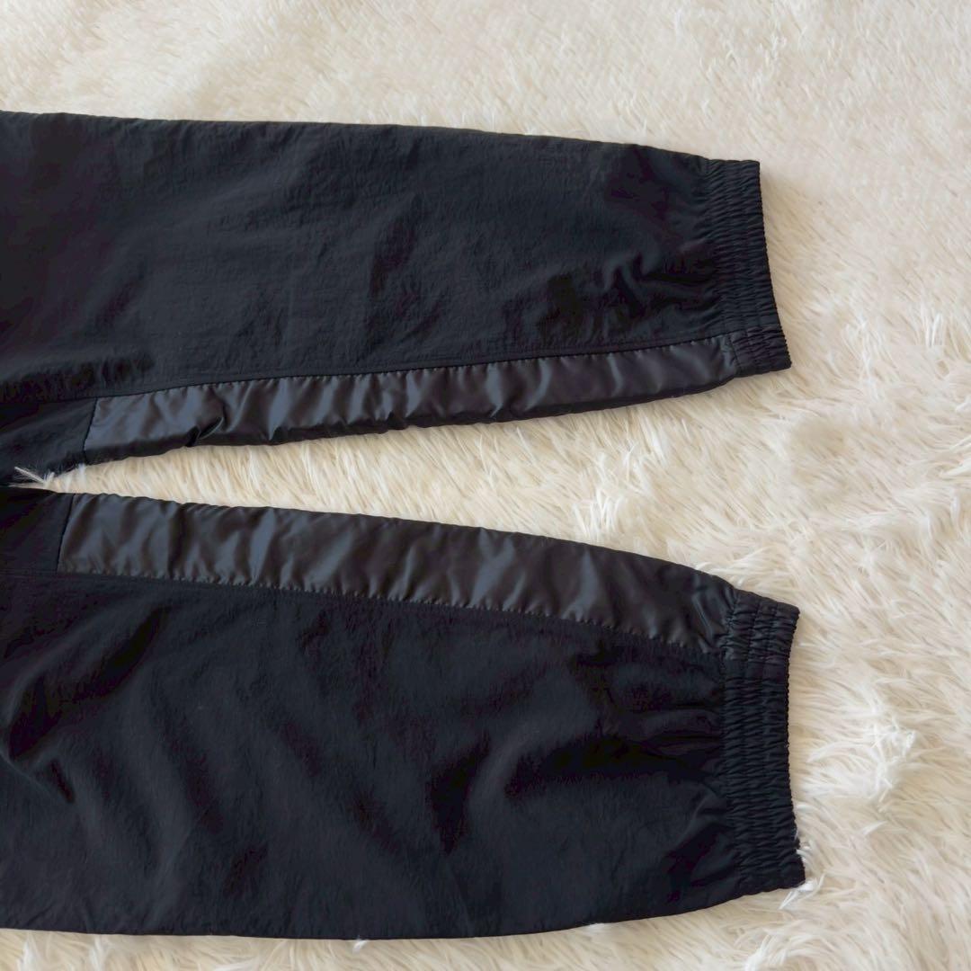 新品タグ付✨New Balance バスケットボール　ウィンドパンツ 黒　M