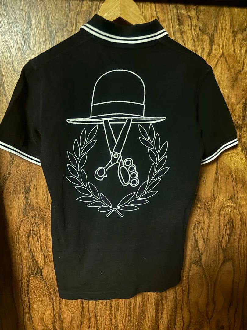 ART COMES FIRST ブラックポロシャツ