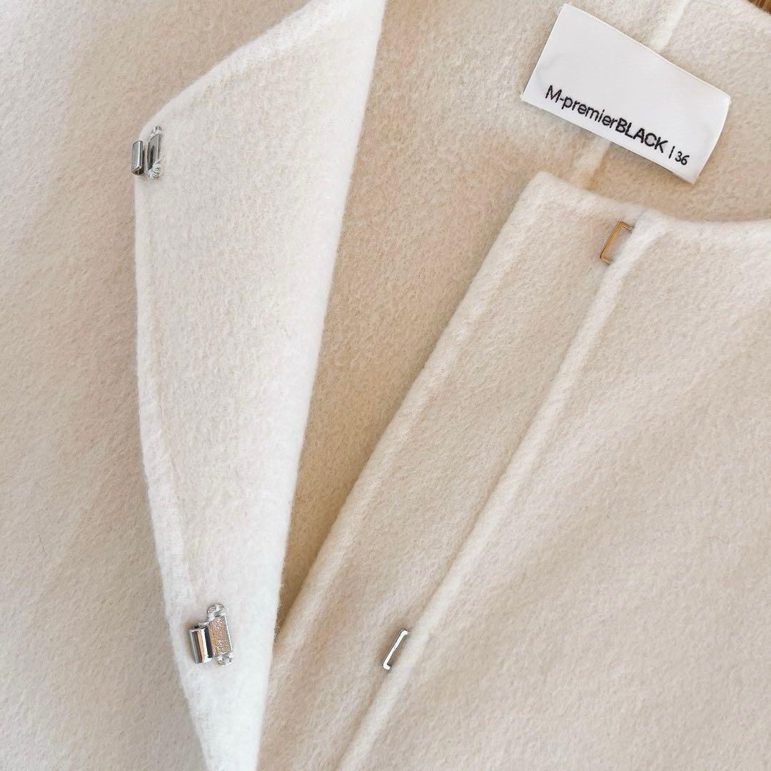 mid. エムプルミエ　ブラック ノーカラーフレアケープコート　アイボリー