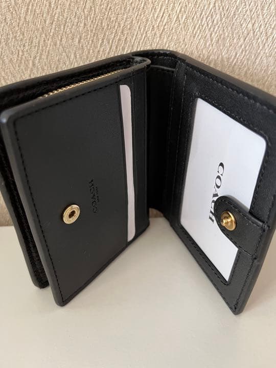 コーチ二つ折り財布