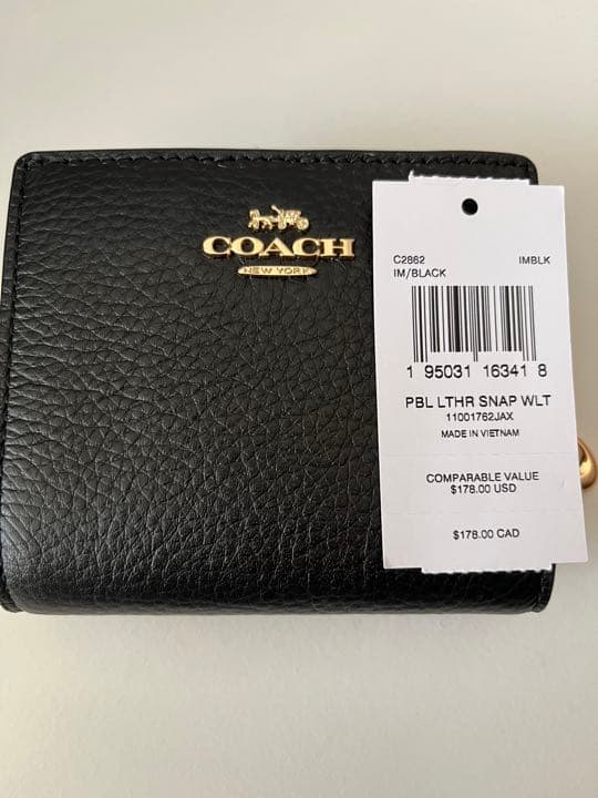 コーチ二つ折り財布