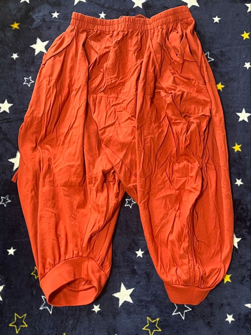 オレンジ サルエルパンツ