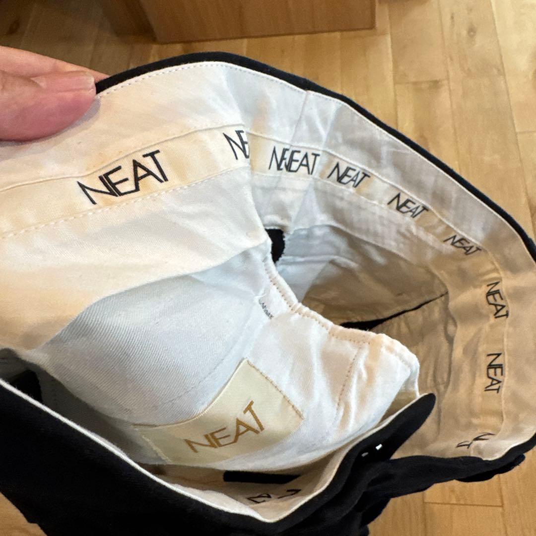 NEAT フレアツータックスラックス ブラック