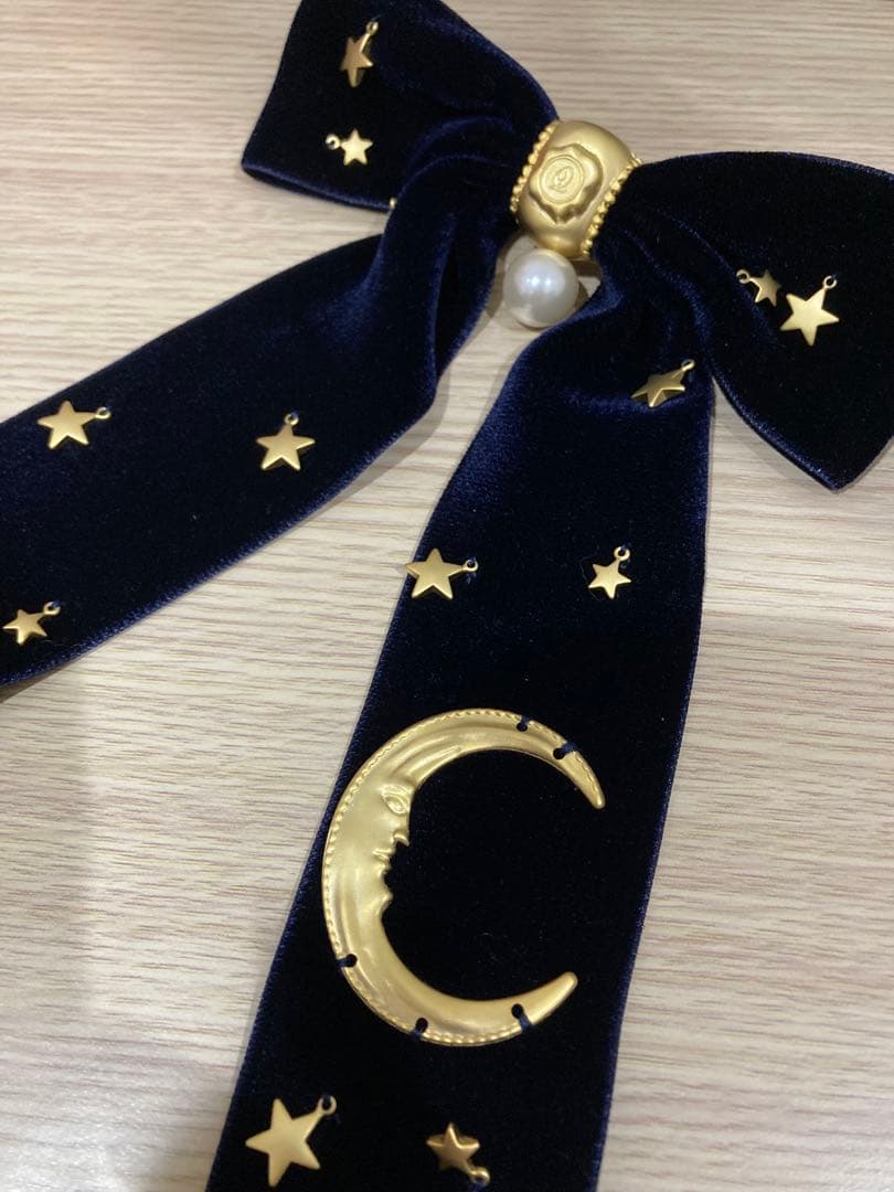 キューポット　リボンブローチ