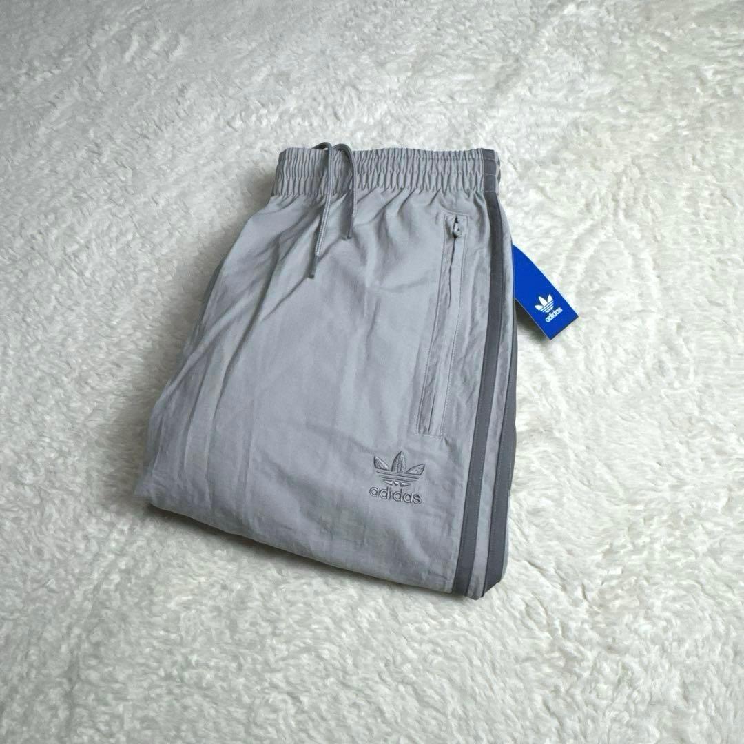 アディカラー ウーブン ファイヤーバードトラックパンツ ジャージ グレー