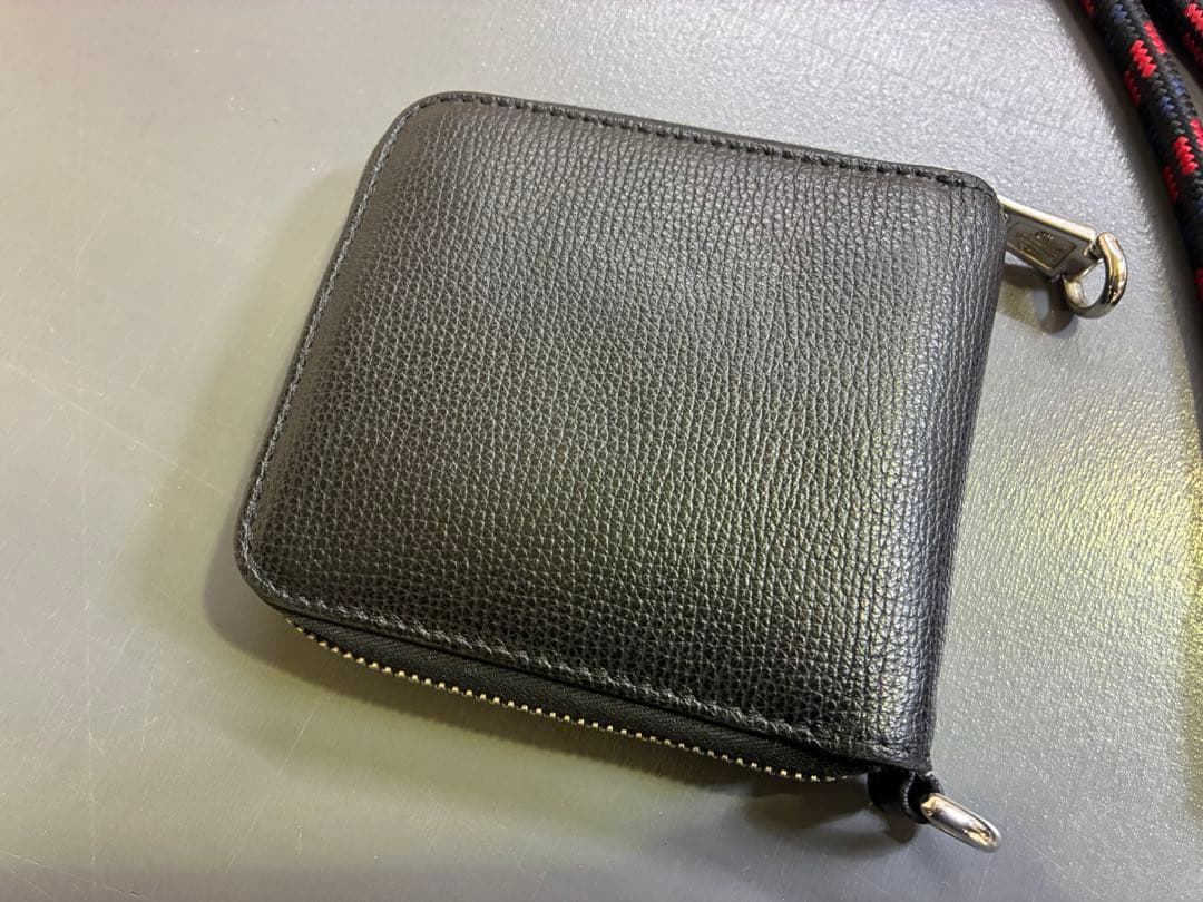 MONCLERモンクレール ラウンドジップ ネックストラップ付き メンズ