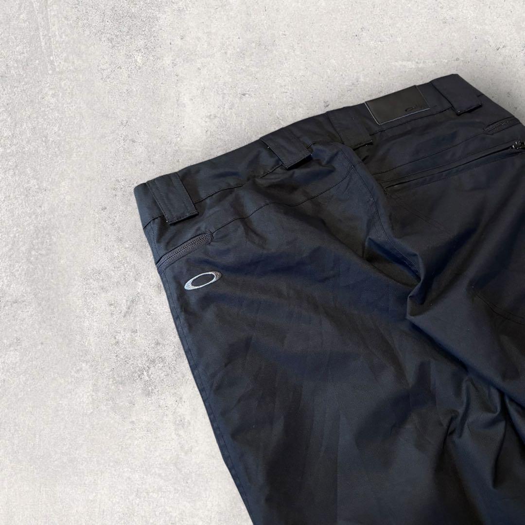 【オークリー】スキー　スノボーパンツ　M 黒　刺繍ロゴ　11年製　希少品　k