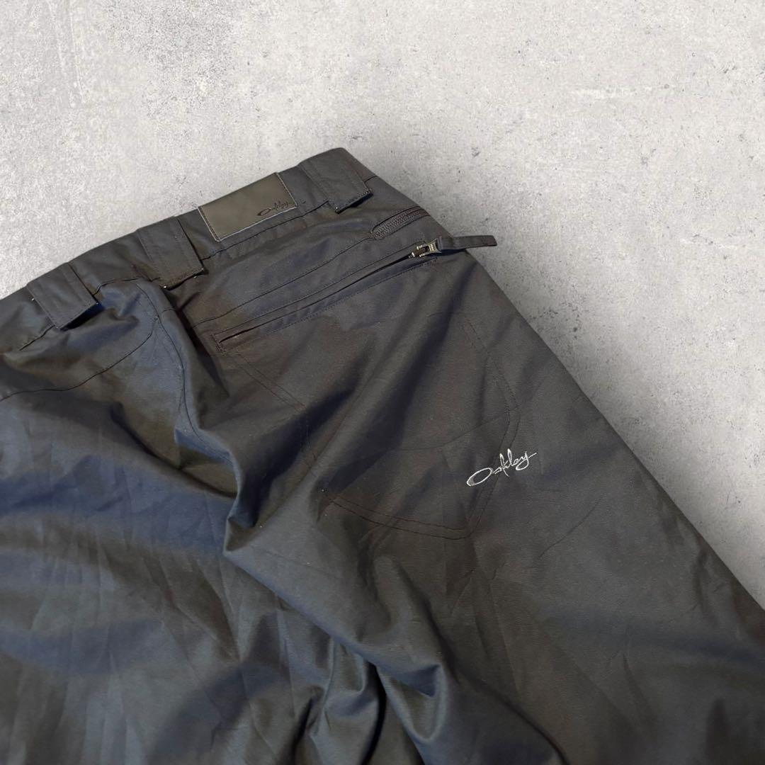 【オークリー】スキー　スノボーパンツ　M 黒　刺繍ロゴ　11年製　希少品　k