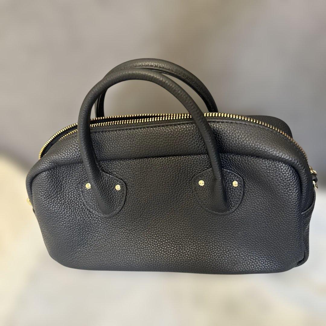 pual ce cin 黒のレザーバッグ ゴールドファスナー付き