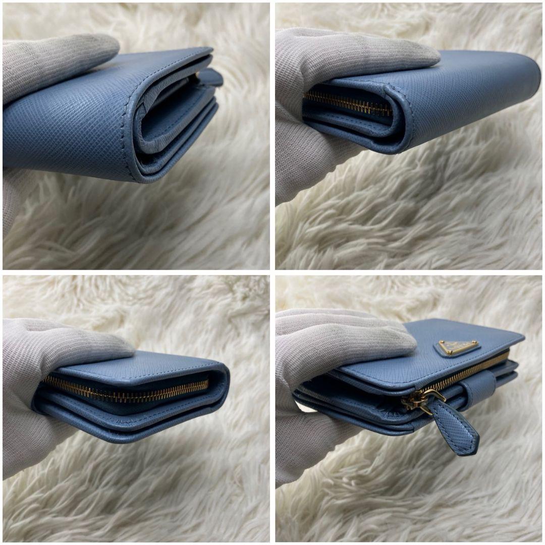 現行 未使用級✨プラダ 二つ折り財布 サフィアーノレザー 三角ロゴ 水色