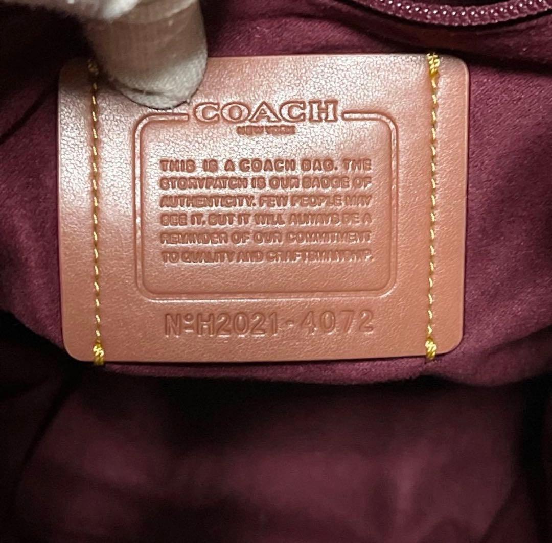 【美品/A4可】COACH 巾着　リュック　レザー　PVC　黒　馬車柄　ロゴ金具