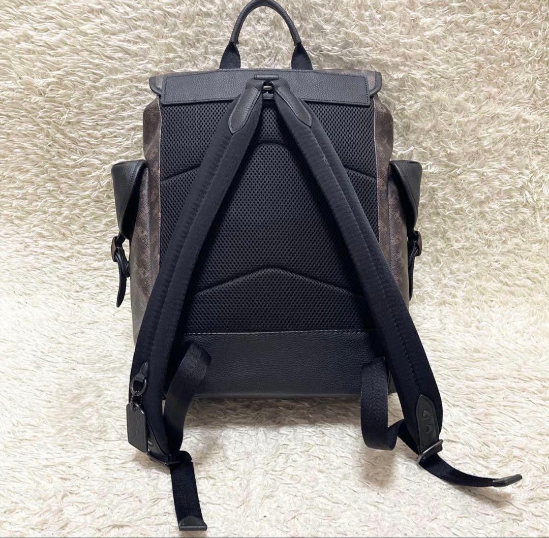 【美品/A4可】COACH 巾着　リュック　レザー　PVC　黒　馬車柄　ロゴ金具