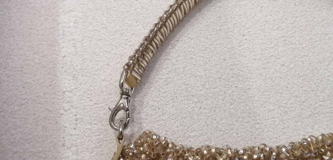 美品アンテプリマ　ゴールド パーティーバッグ