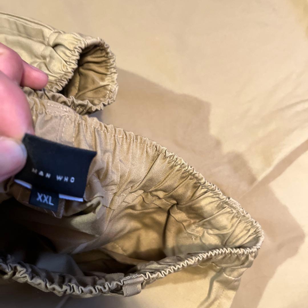 manwhoパンツ 薄いベージュ
