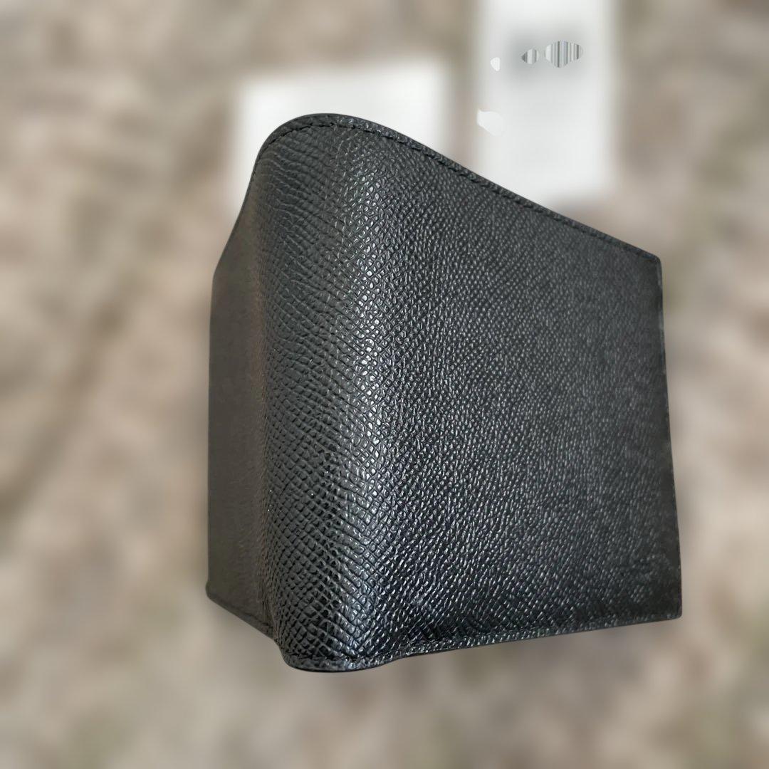 新品未使用　49500円 COACH 二つ折り