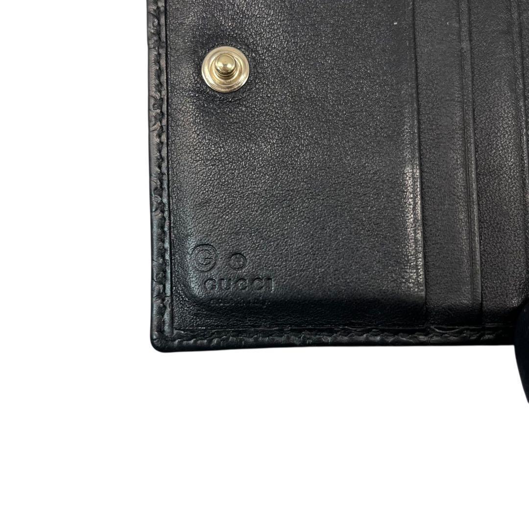 希少✨グッチ 二つ折り財布 GG マイクロシマ ロゴ型押し レザー ブラック