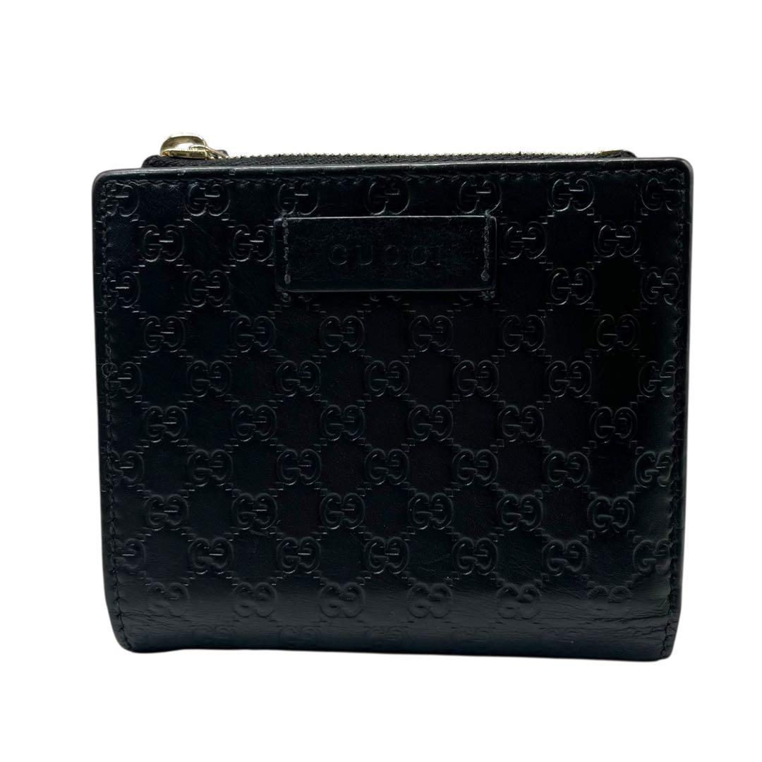 希少✨グッチ 二つ折り財布 GG マイクロシマ ロゴ型押し レザー ブラック