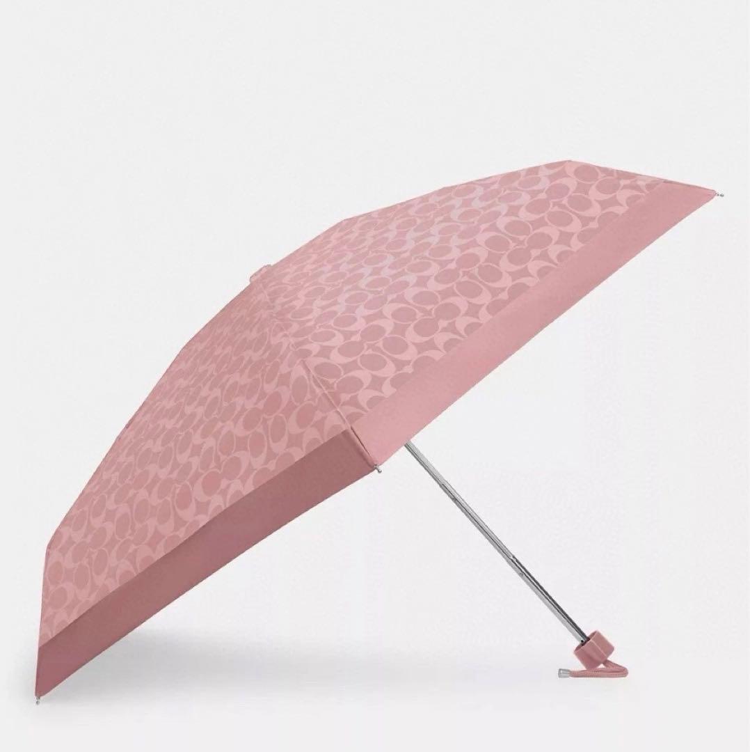 新品☆COACH(コーチ) 折りたたみ傘　ピンク　シグネチャー UVカット