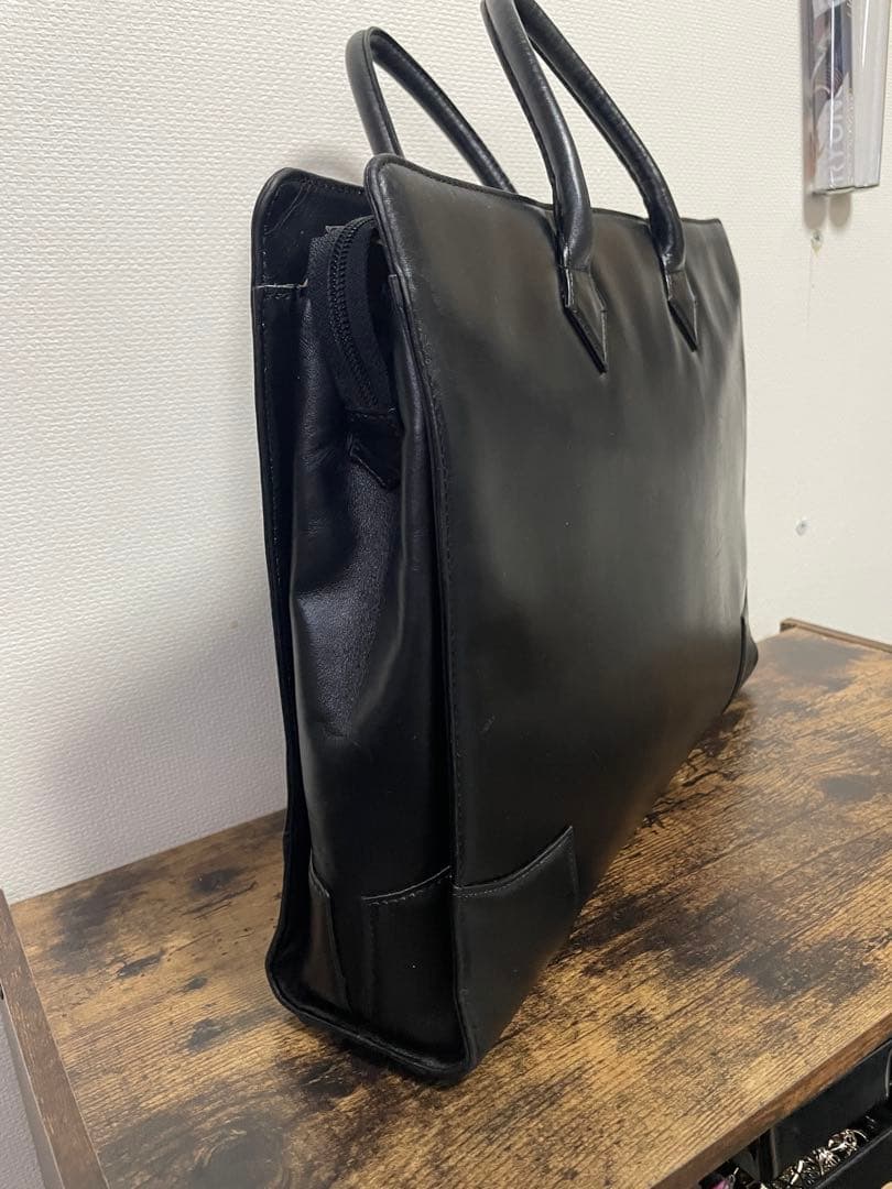チャーム付き！ ヴィヴィアンウエストウッド　牛革　ビジネスバッグ