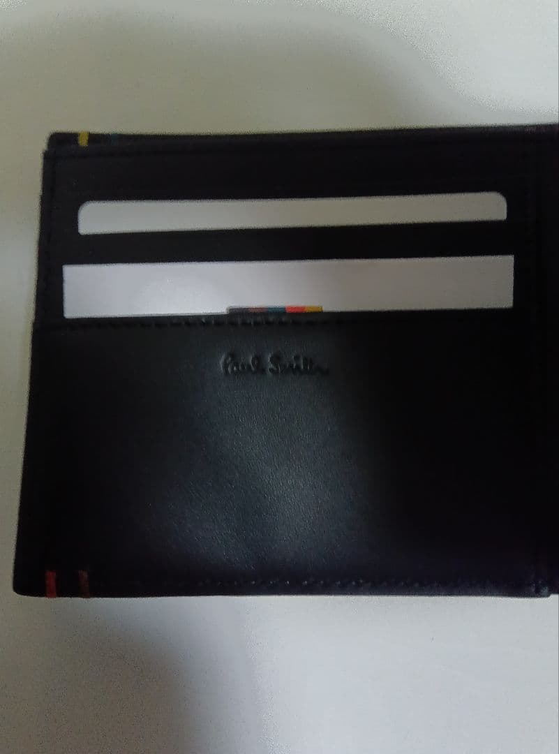 エド出品です！！ポール・スミス 二つ折り財布 黒 新品未使用品 箱付き