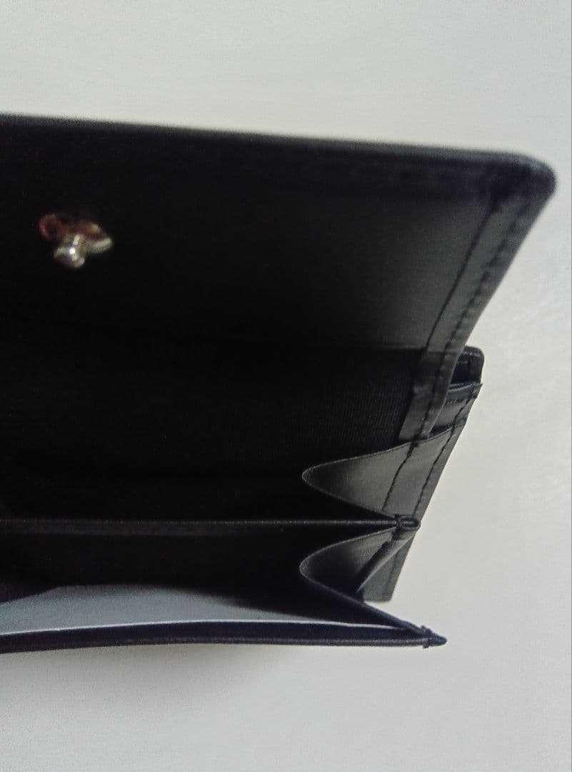 エド出品です！！ポール・スミス 二つ折り財布 黒 新品未使用品 箱付き