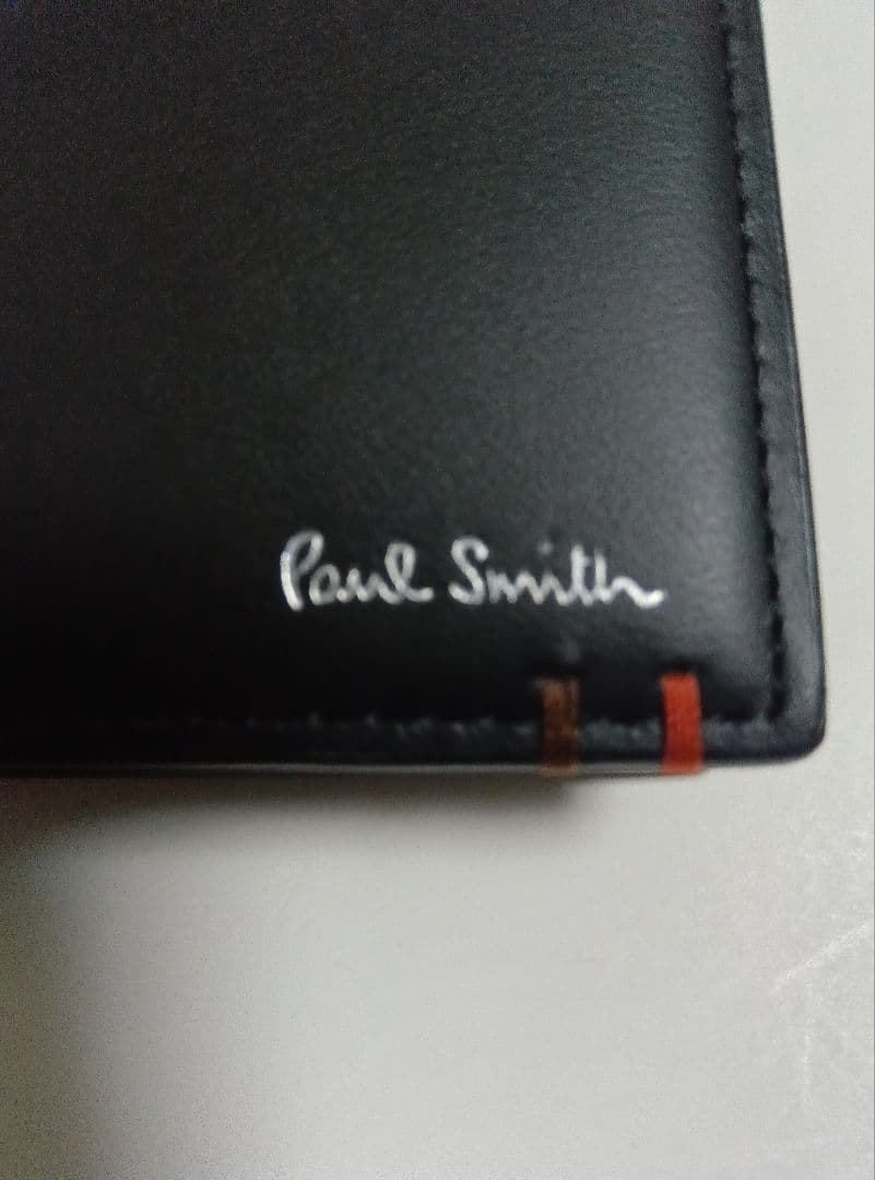 エド出品です！！ポール・スミス 二つ折り財布 黒 新品未使用品 箱付き