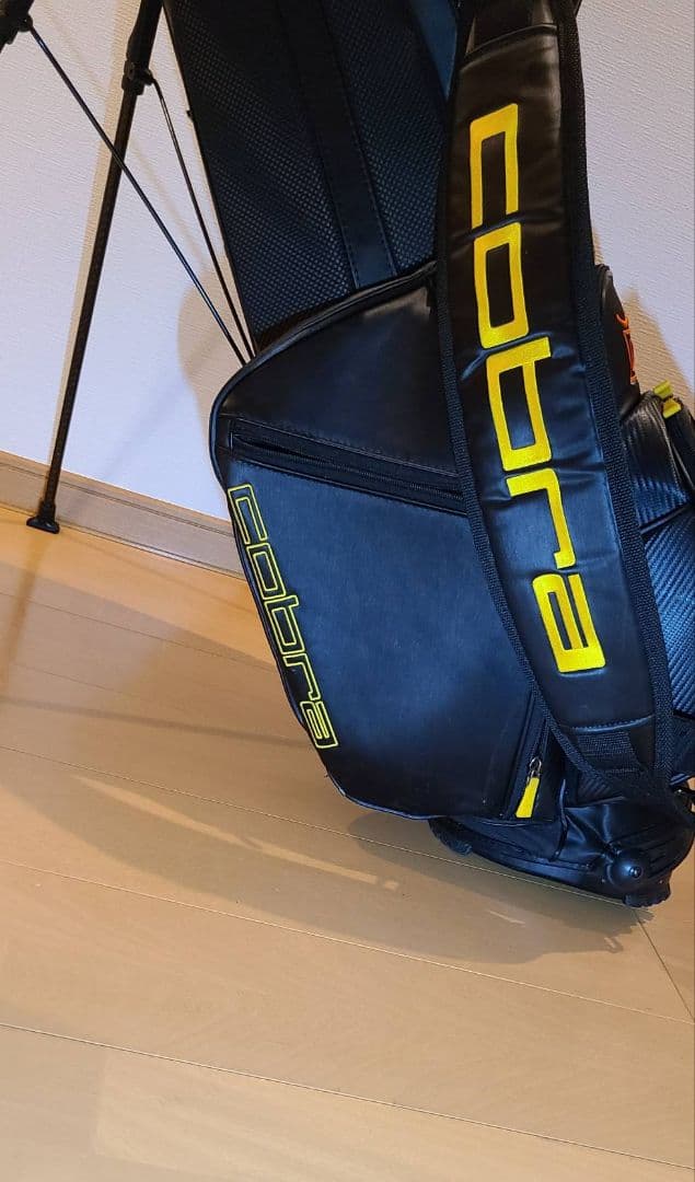 コブラ　ベゼルコラボスタンドバッグ 黒/黄色